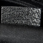 Bolso de hombro horizontal de lona jacquard negra con monograma