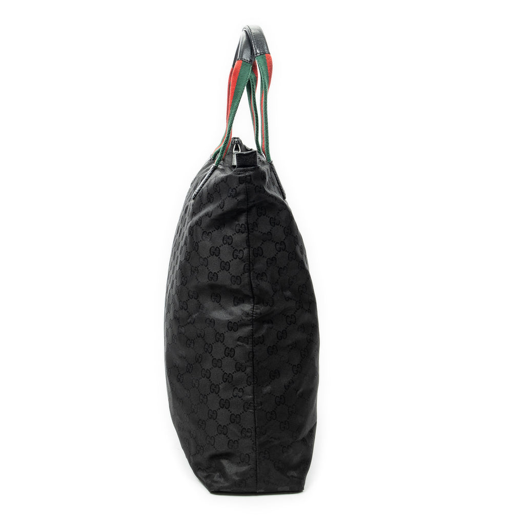 Sac à bandoulière vertical haut en toile de nylon noir monogrammé