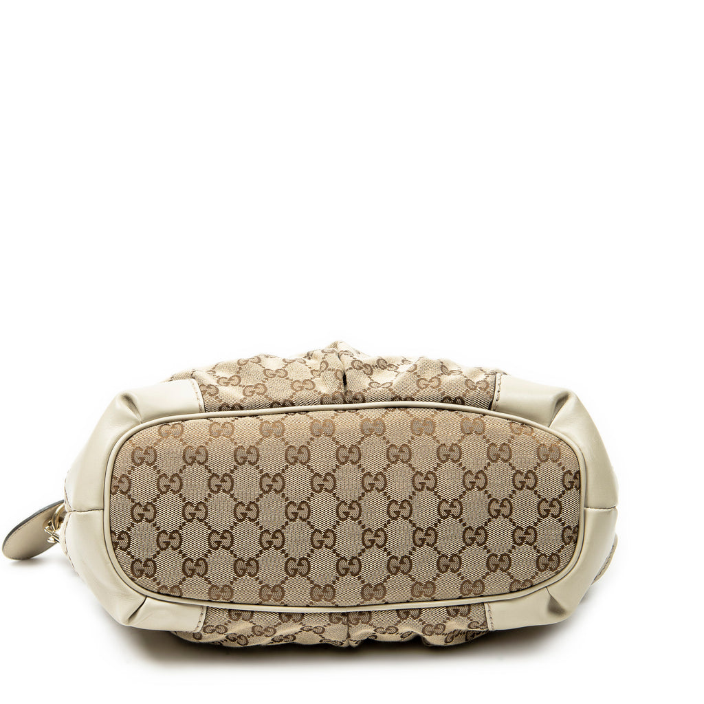 Bolso de Hombro Sukey Top Handle de Lona Monogrammed Beige