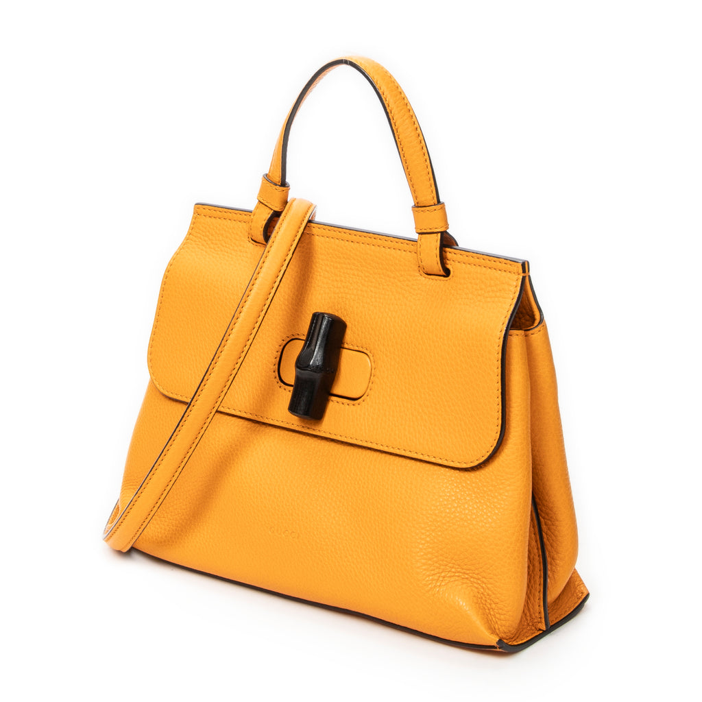 Sac porté épaule petit bambou quotidien anse supérieure cuir de veau grainé jaune moutarde