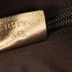 Bolso bandolera mediano de lona con monograma beige
