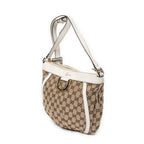 Bolso de hombro con anilla en D de lona con monograma beige