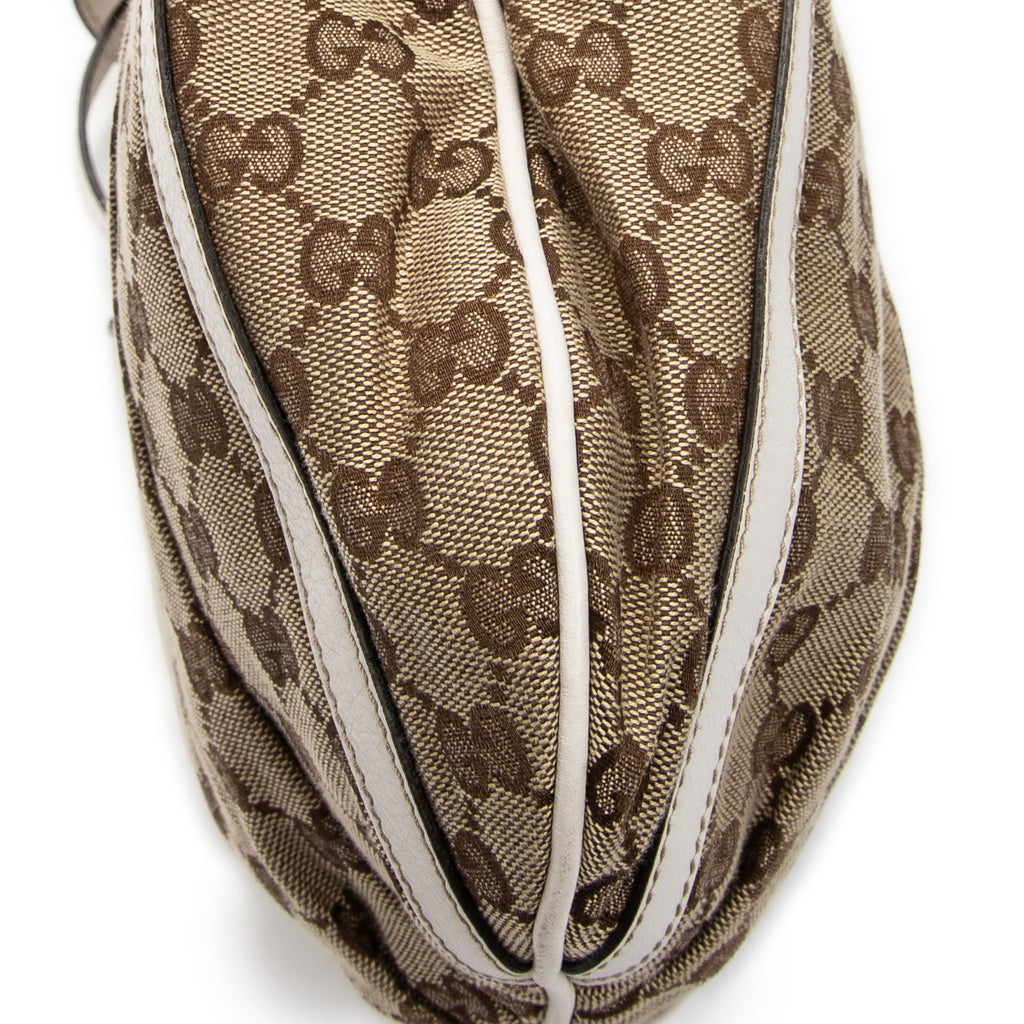 Bolso de hombro con anilla en D de lona con monograma beige