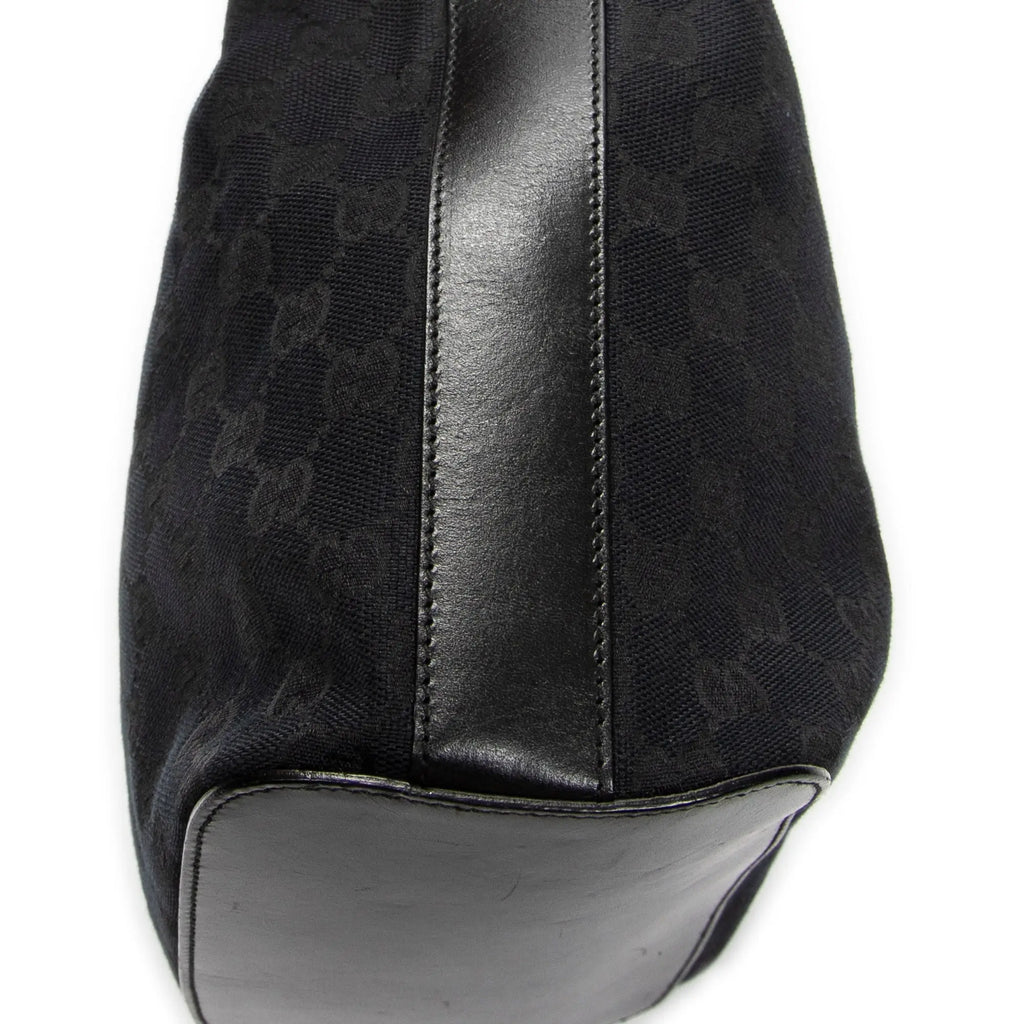 Bolso de hombro Hobo con cremallera Lona negra monogramada