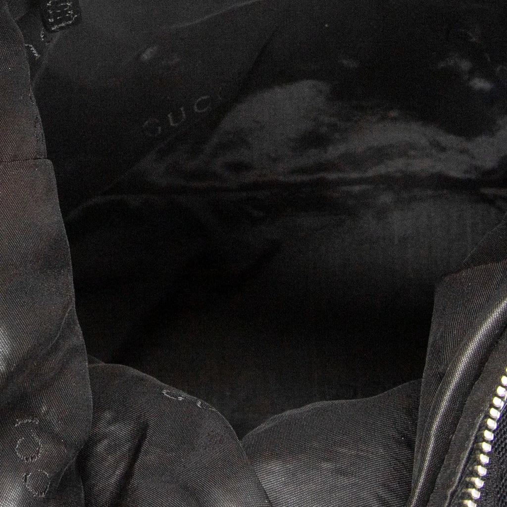 Bolso de hombro Hobo con cremallera Lona negra monogramada
