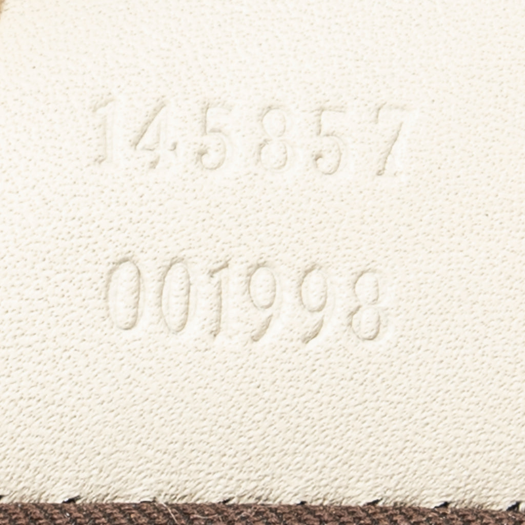 Bolso bandolera mediano de lona con monograma beige