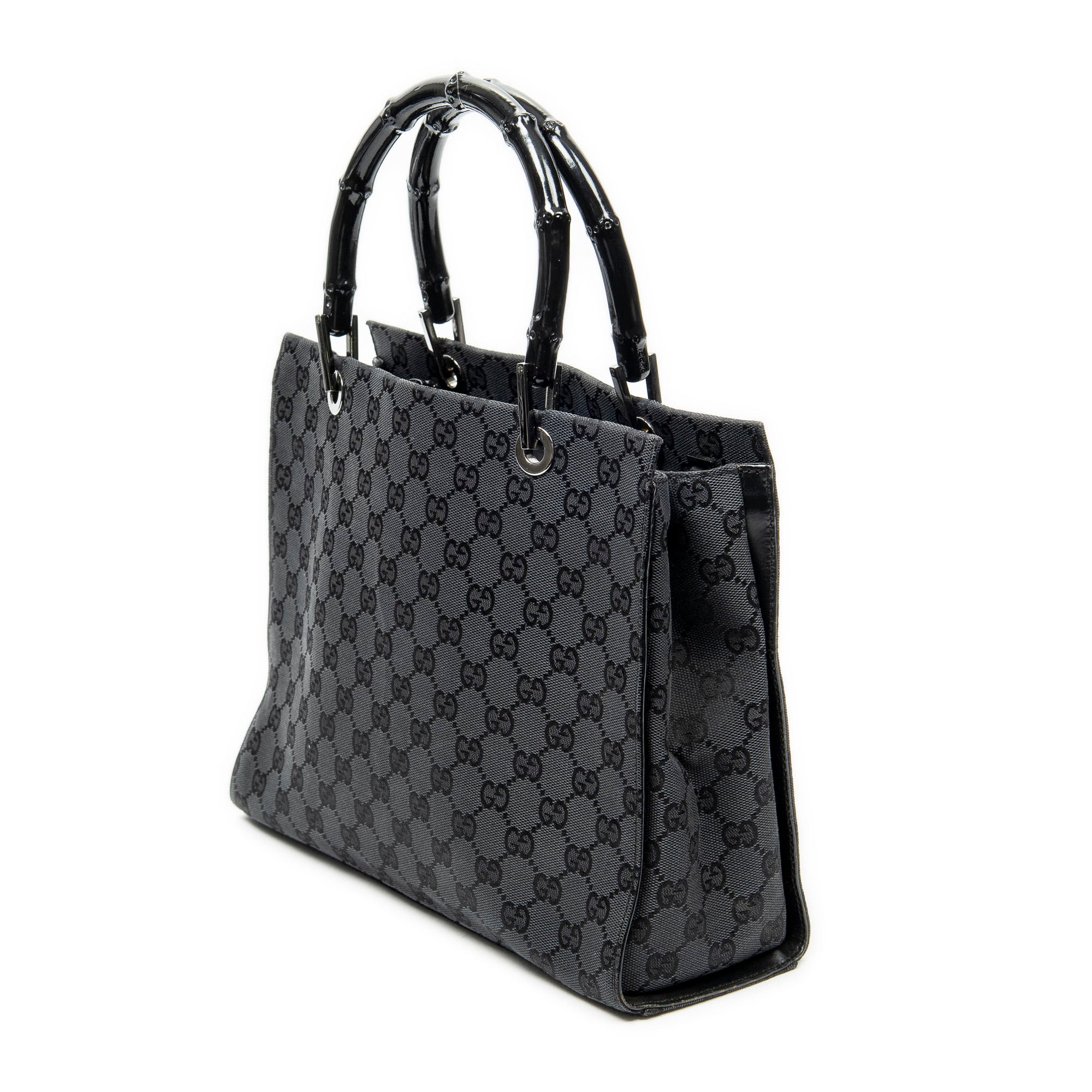 Bolso de mano de lona con monograma negro y bambú