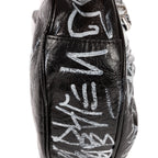 Bolso de hombro XS Le Cagole de piel de becerro negra con grafiti