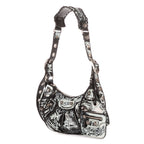 Bolso de hombro XS Le Cagole de piel de becerro negra con grafiti