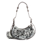 Bolso de hombro XS Le Cagole de piel de becerro negra con grafiti
