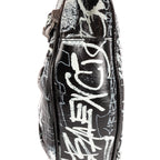 Bolso de hombro XS Le Cagole de piel de becerro negra con grafiti