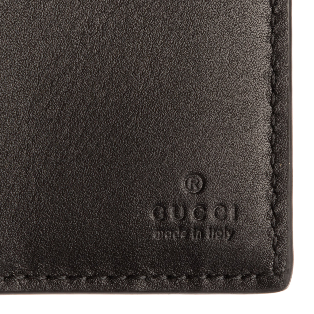 Portefeuille à deux volets Emblem en toile monogrammée grise