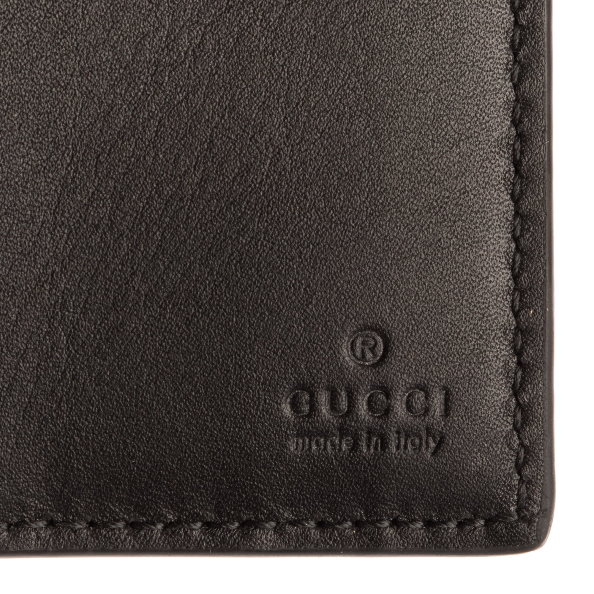 Portefeuille à deux volets Emblem en toile monogrammée grise