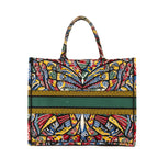 Bolso de hombro edición limitada de lona estampada con libro de mariposas en verde