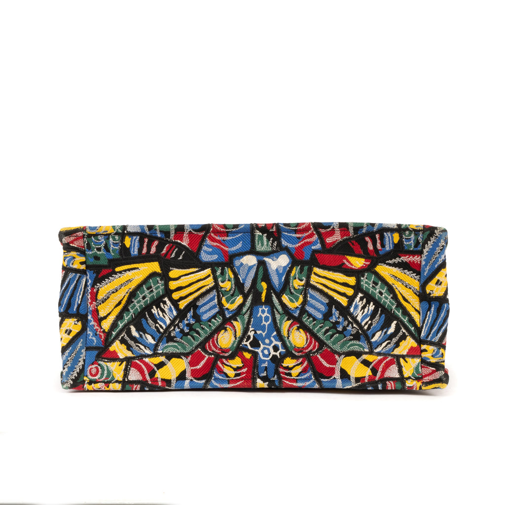 Bolso de hombro edición limitada de lona estampada con libro de mariposas en verde
