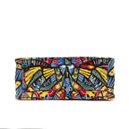 Bolso de hombro edición limitada de lona estampada con libro de mariposas en verde