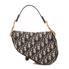 Bolso de mano Oblique Saddle Mini lona Oblique Diorissimo azul marino