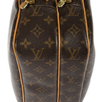 Bolso Reporter PM Lona Monogram Marrón