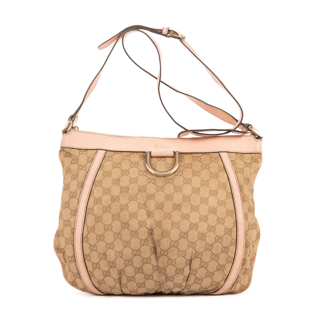 Bandolera Abbey con anilla en D de lona GG Monogram rosa