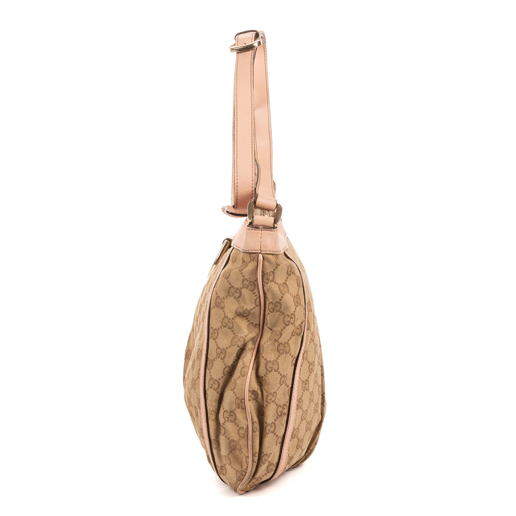 Bandolera Abbey con anilla en D de lona GG Monogram rosa