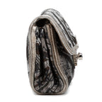 Pochette Thalie noire matelassée en toile brodée édition limitée