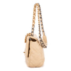 Sac bandoulière 19 à rabat en cuir de veau matelassé beige
