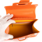 Sac à bandoulière Saigon PM en toile enduite Goyardine orange