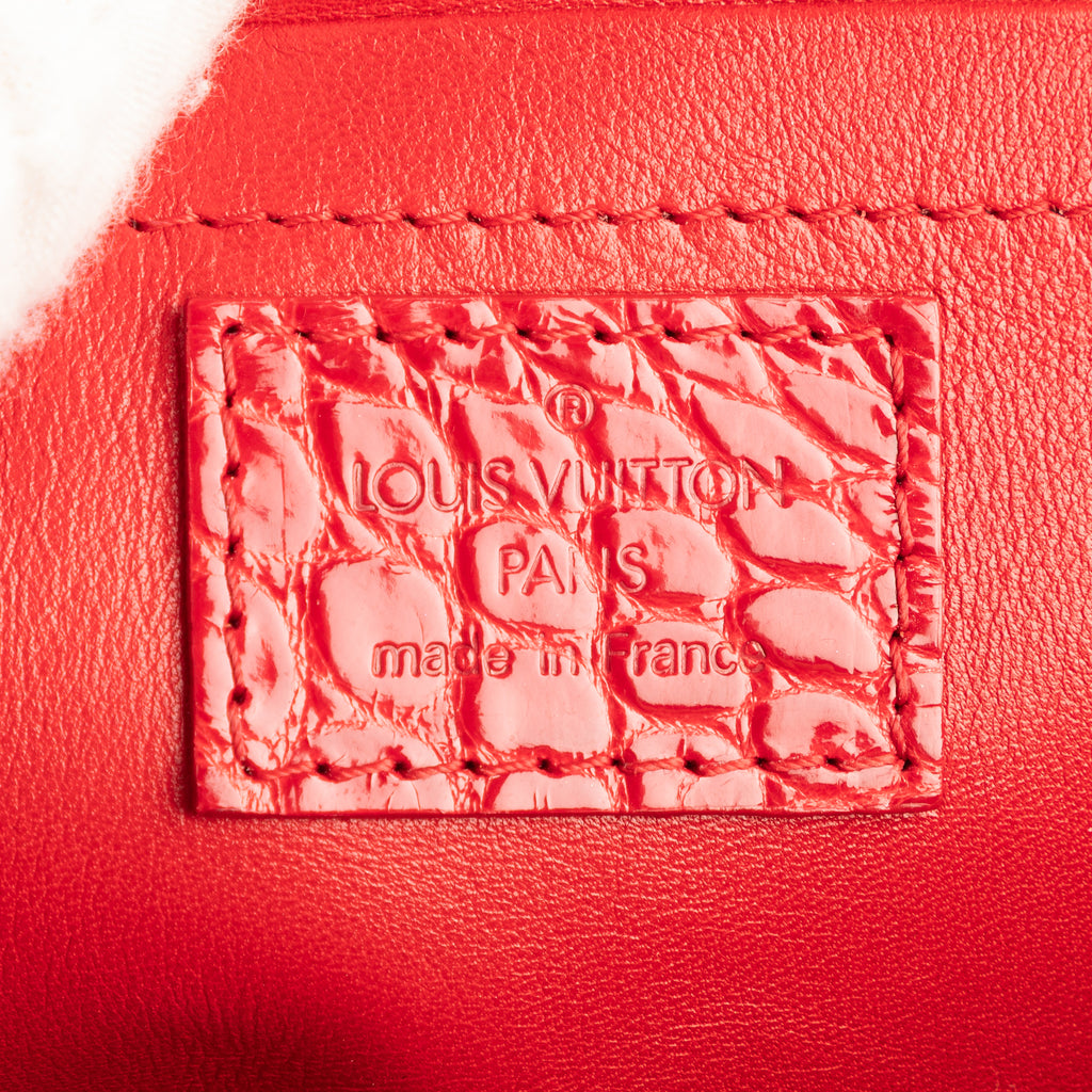 Bandolera Ed. Ltda. Monogram Velours Irvine de terciopelo rojo con patrón de cocodrilo
