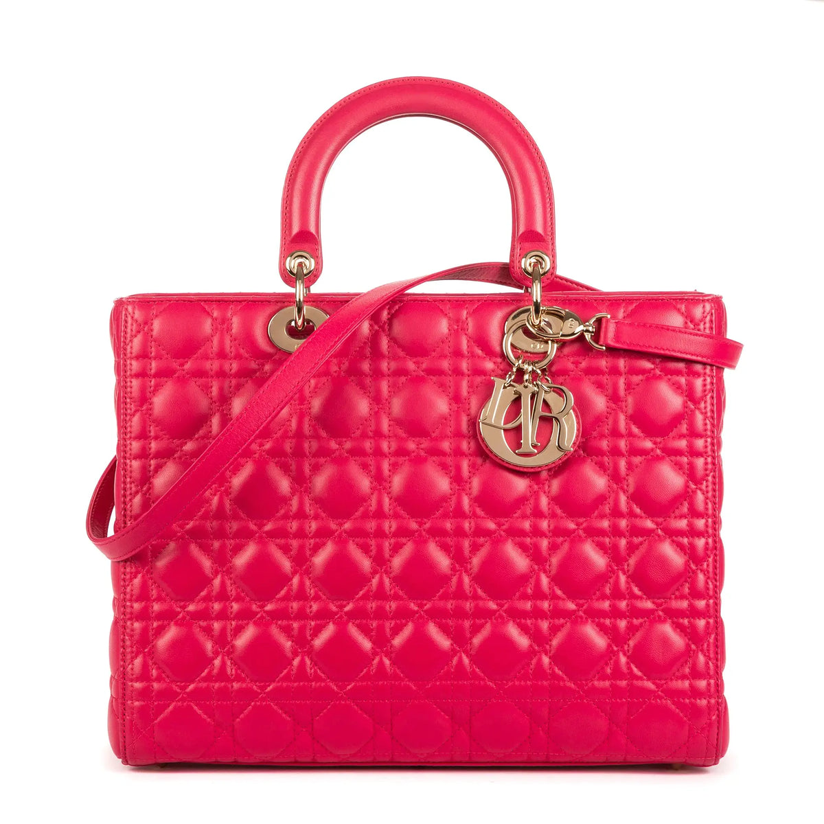 Sac bandoulière Lady Dior grand modèle en cuir cannage rose