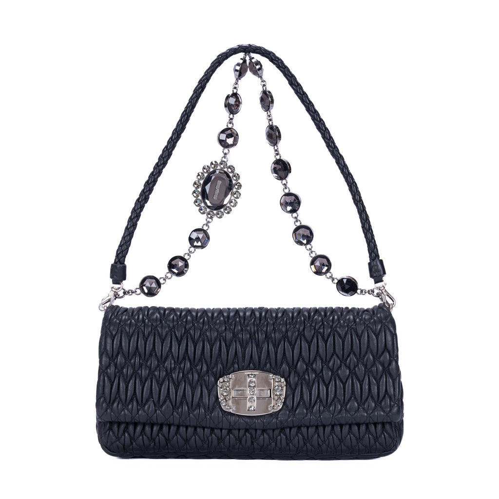 Clutch de cristal con efecto cloqué en piel de napa negra Gaufre