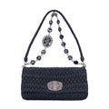 Clutch de cristal con efecto cloqué en piel de napa negra Gaufre