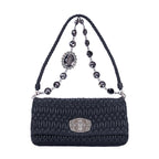 Clutch de cristal con efecto cloqué en piel de napa negra Gaufre