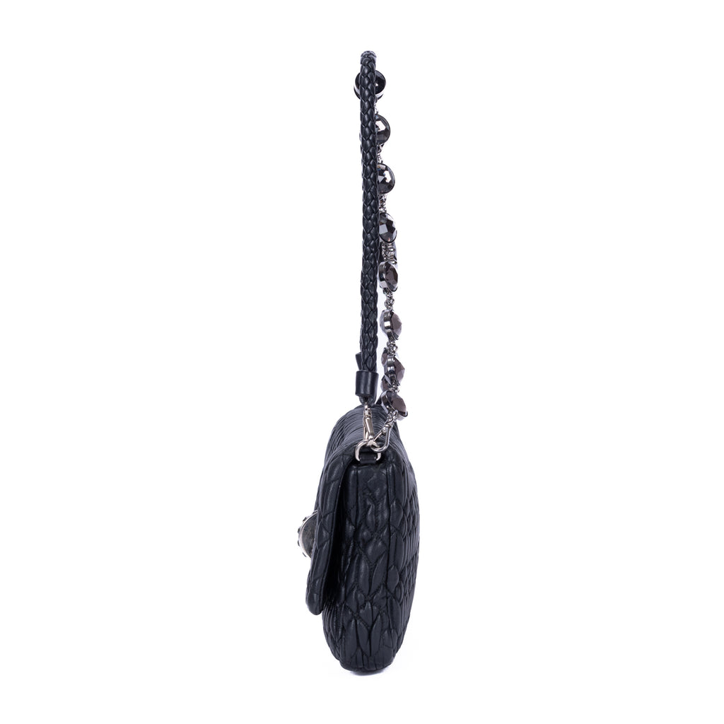 Clutch de cristal con efecto cloqué en piel de napa negra Gaufre
