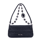 Clutch de cristal con efecto cloqué en piel de napa negra Gaufre