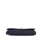 Clutch de cristal con efecto cloqué en piel de napa negra Gaufre