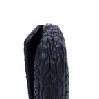 Clutch de cristal con efecto cloqué en piel de napa negra Gaufre