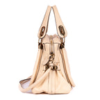 Bolso de mano mediano Paraty de piel de becerro granulada beige