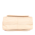 Bolso de mano mediano Paraty de piel de becerro granulada beige