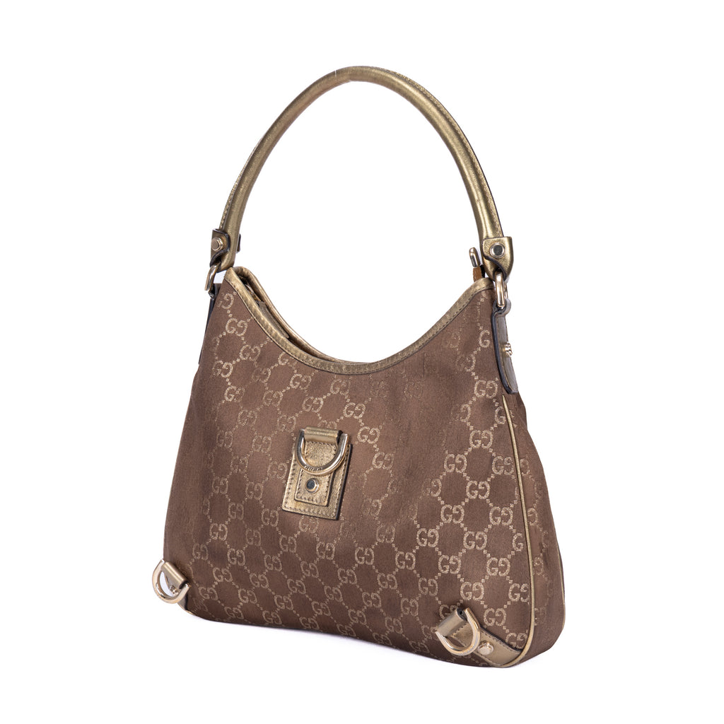 Bolso Abbey de aro D de lona monogram en marrón