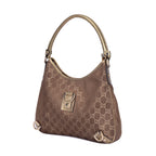 Bolso Abbey de aro D de lona monogram en marrón