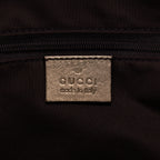Bolso Abbey de aro D de lona monogram en marrón