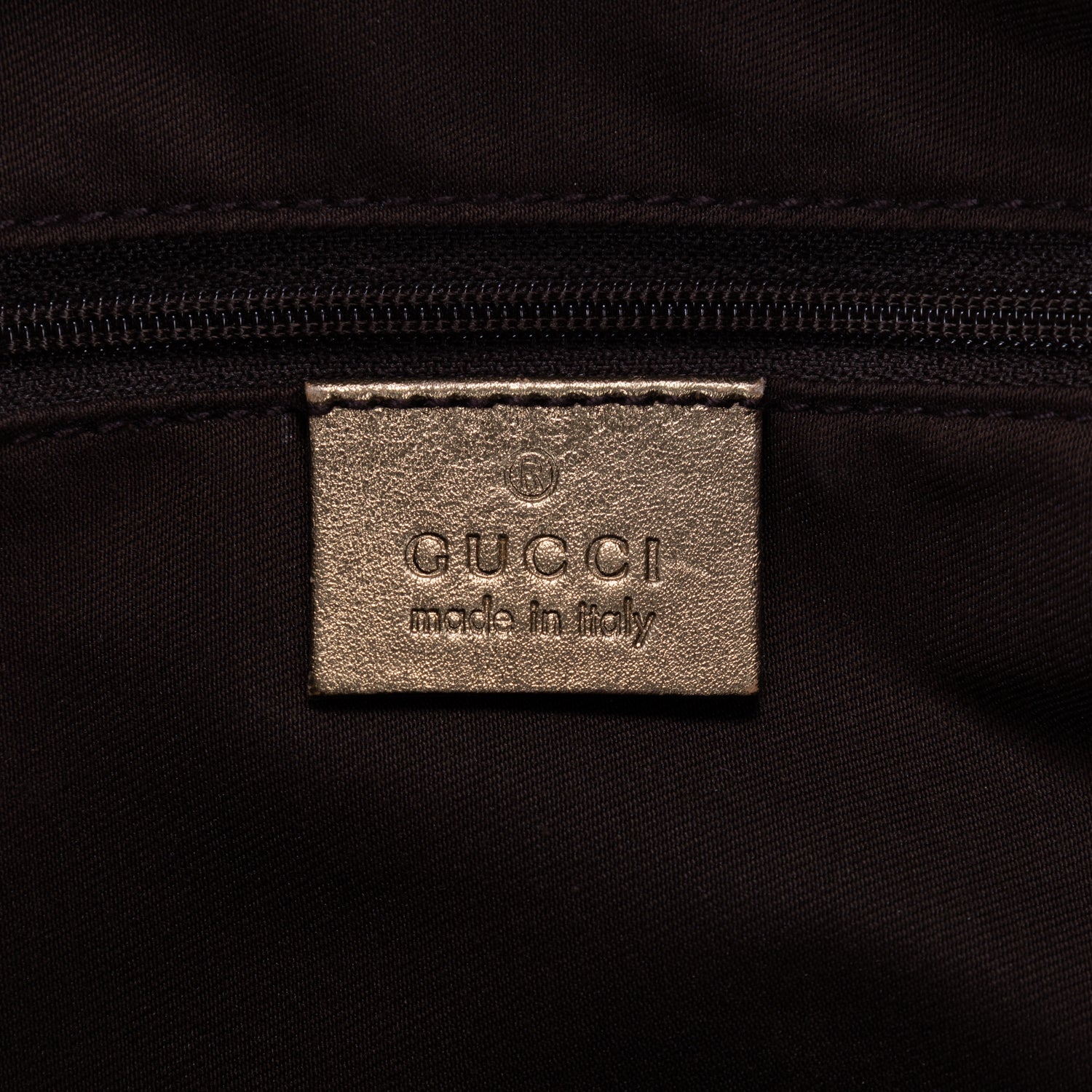 Bolso Abbey de aro D de lona monogram en marrón
