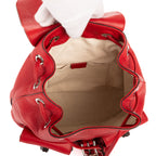 Mochila de bambú con borlas de cuero granulado rojo