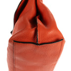 Bolso de mano de bambú con asa superior de cuero granulado naranja