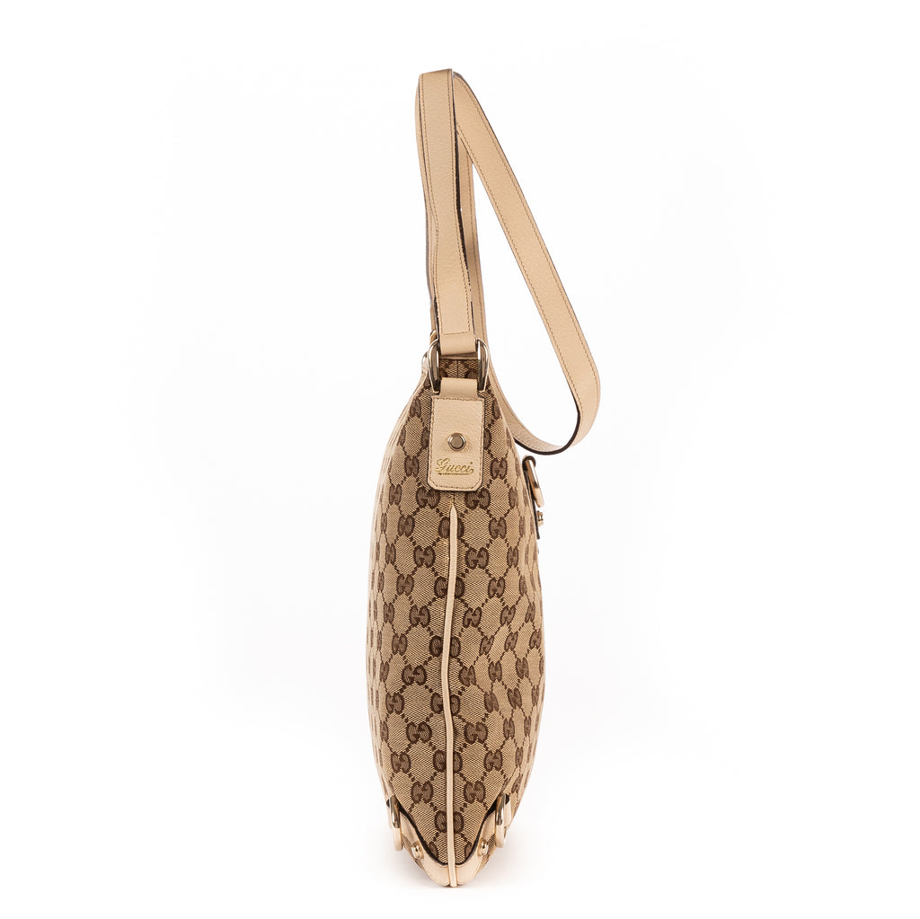 Sac bandoulière Abbey Messenger D-ring en toile monogrammée GG ivoire