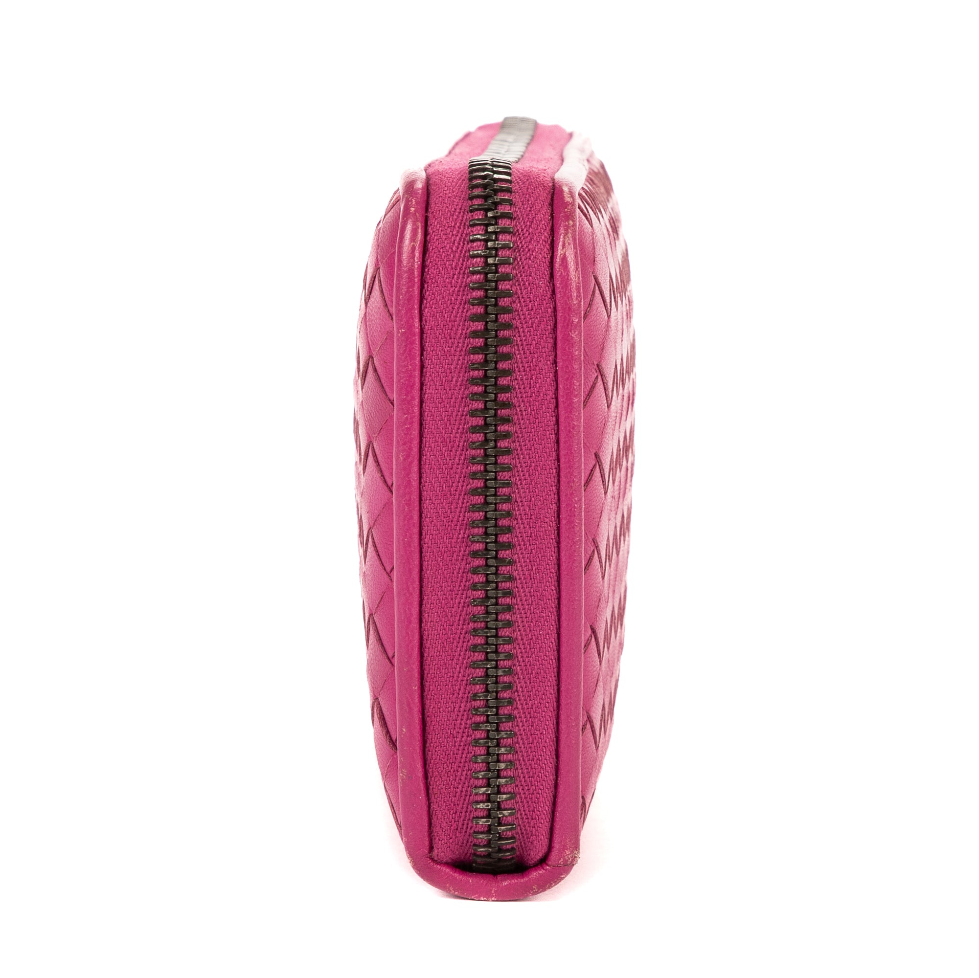 Cartera con cremallera completa de piel de napa trenzada rosa