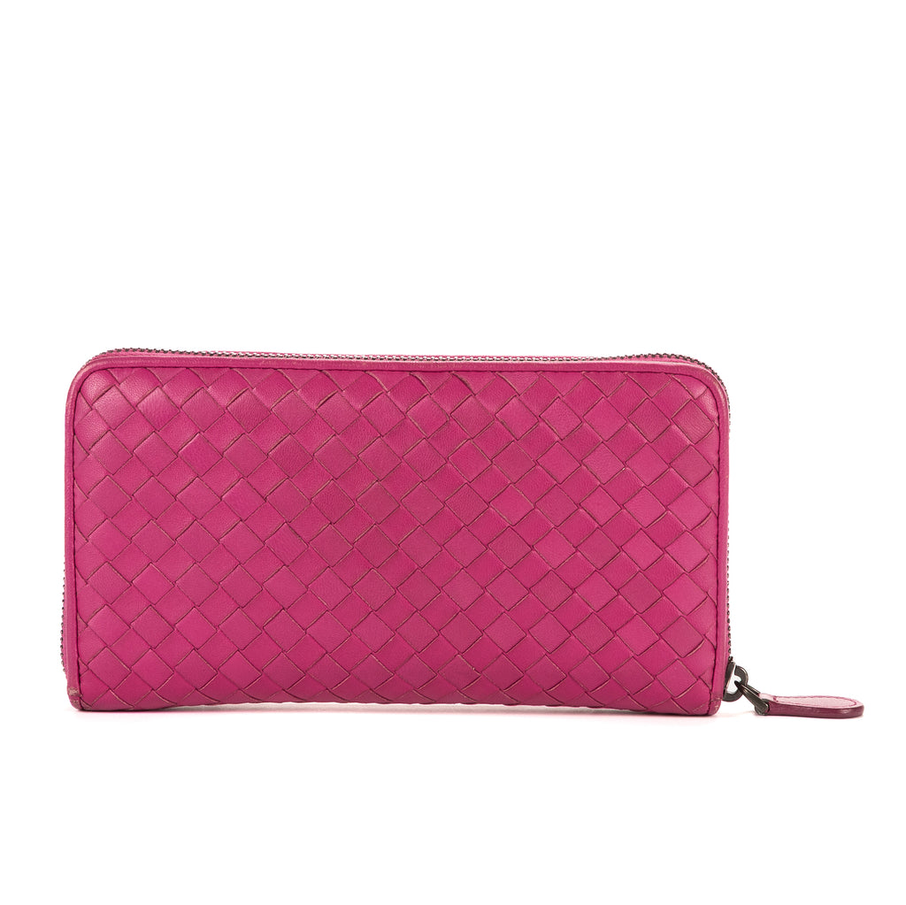 Portefeuille zippé en cuir nappa Intrecciato rose