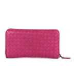 Portefeuille zippé en cuir nappa Intrecciato rose