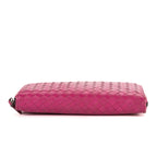 Portefeuille zippé en cuir nappa Intrecciato rose