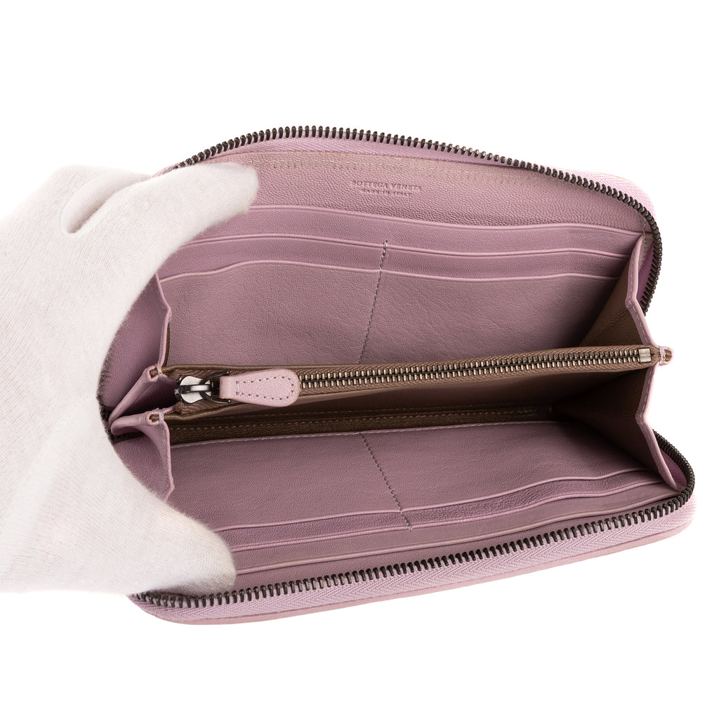 Portefeuille zippé en cuir nappa intrecciato rose